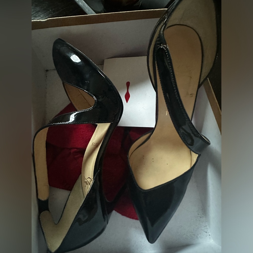 Authentic louboutins worn few times have extra heel covers bottoms can be redone
